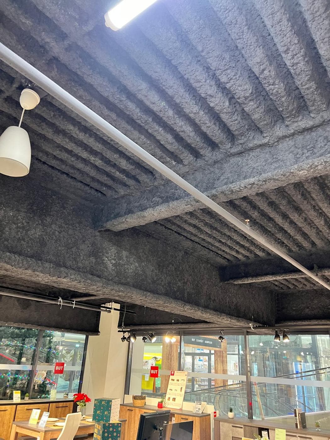 Flocage isolation thermique — Plancher nervuré, surface commerciale